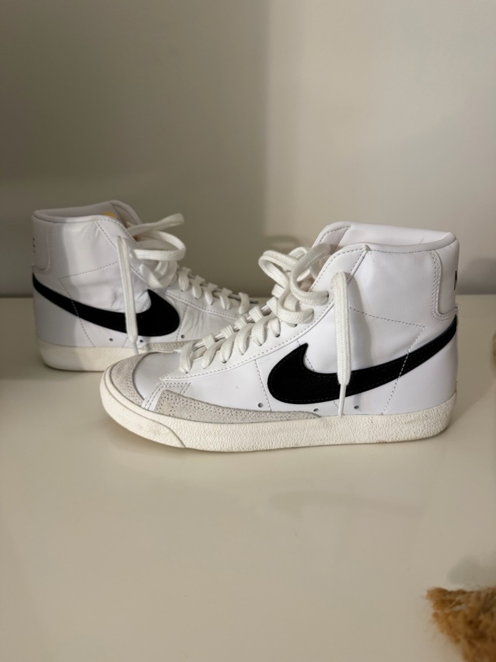 Nike White Sneakers with Red Swoosh and Yellow Accents